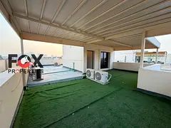 Luxury furnished 6-master-bedroom villa for annual rent in Al Zahya, Ajman. Living room, majlis, 8 b