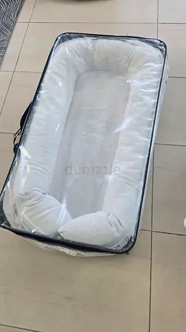 Dockatot sleepyhead with spare cover