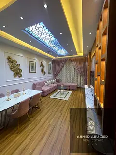 Luxury 2BR furnished at Ajman One. Parking, store, laundry room. Family layout. AED 60k/yr in 6 cheq