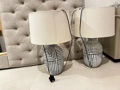 Pair of ceramic table lamps with fabric shades — neutral geometric design