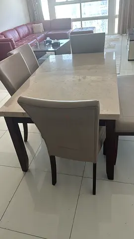 Real Marble-top dining table with 6 beige upholstered chairs - excellent condition