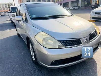 2006 Nissan TIIDA — фото 1