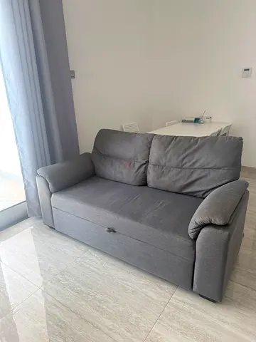 A sofa that can be converted into a bed