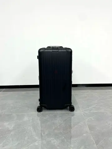 Matte black hardshell roller suitcase