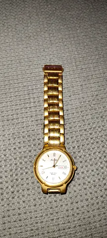 Vintage Alba Gold Tone Men's Watch with Day-Date Display
