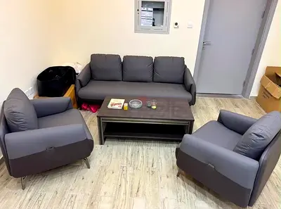 Gray 3-Seater Sofa with Two Armchairs and Coffee Table - Good Condition