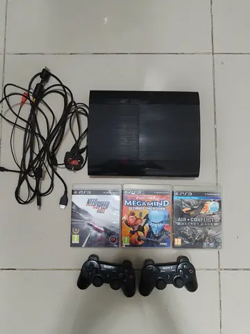 Ps3 with controllers and games