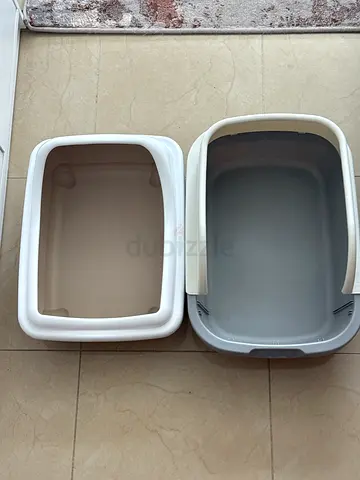 Two cat litter boxes (used) cleaned & sanitized - good condition