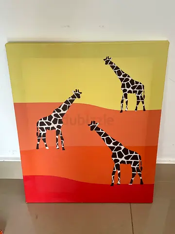 Canvas wall art with giraffe silhouettes - 3-panel style