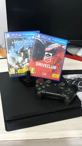 Version 12.50 PS4 SLIM 512GB 2 GAMES 1 CONTROLLER POWER HDMI AND CHARGING CABLE