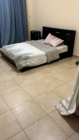 Queen bed with headboard and mattress - good condition