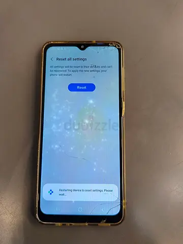Samsung Galaxy A12 Smartphone with Cracked Screen