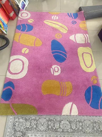 Pink abstract patterned rug - good used condition must go today 25 AED