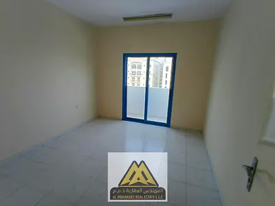 Annual Rent – 1BR & Living | Al Hamidiya 1, Ajman. Balcony, central AC, and prime location.