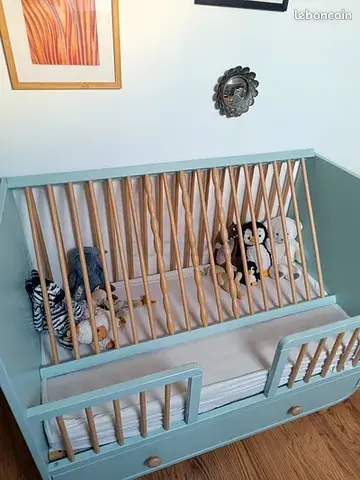 Solid wood convertible baby crib with storage drawer -