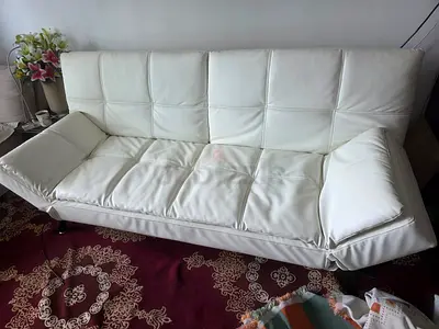 White faux leather 3-seater sofa bed - good condition