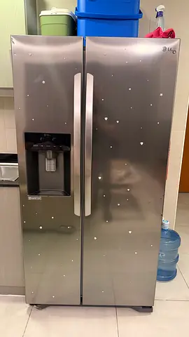 LG Stainless Side-by-Side Fridge with Water & Ice Dispenser - Good Condition