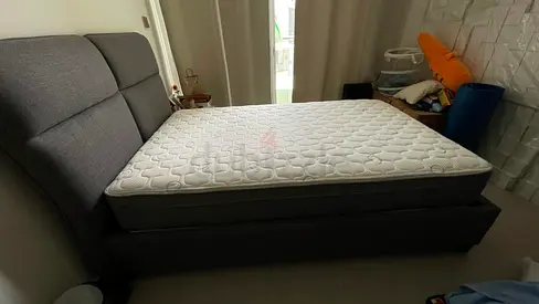 Grey fabric double bed frame without mattress - good condition