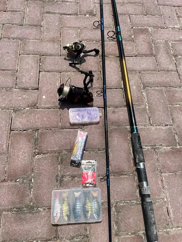 Fishing rods with reels and lures - complete set, good condition
