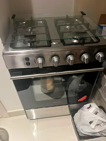 Stainless Steel 4-Burner Gas Cooker with Oven - Good Condition