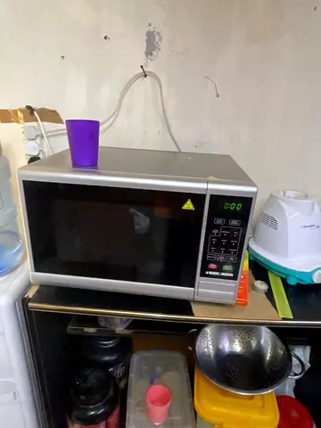 Used Black & Silver Microwave Oven - Good Working Condition