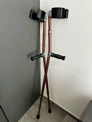 Adjustable crutches