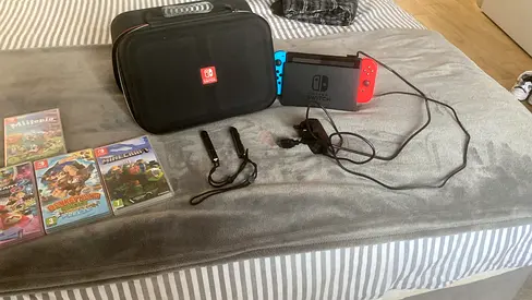 Nintendo Switch console with Joy-Cons, dock, case and 5+ games - good condition