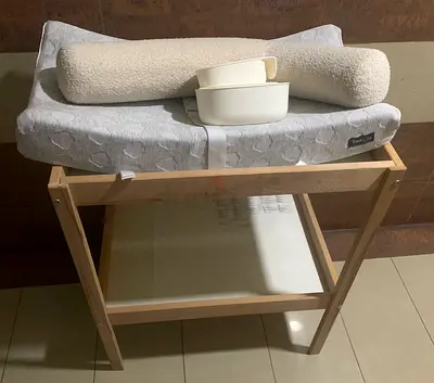 Changing Table with Changing Pad and noodle pillow