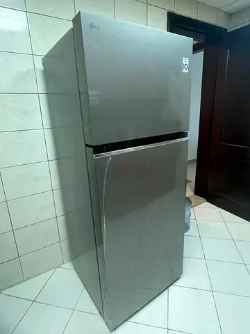 LG top-freezer refrigerator in good working condition