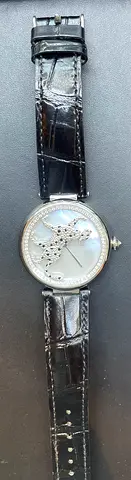Ladies wristwatch with mother-of-pearl dial and leather strap