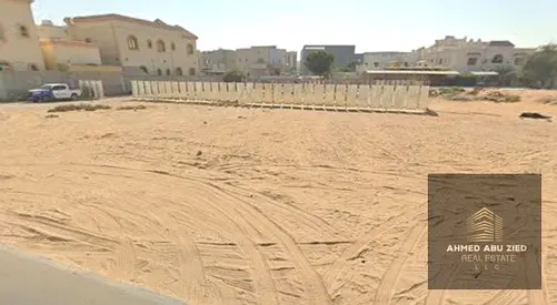 Residential investment land for sale in Al Mowaihat 2, Ajman, on an asphalt road and sikka, prime location near a mosque and park, 4,843 sq. ft., AED