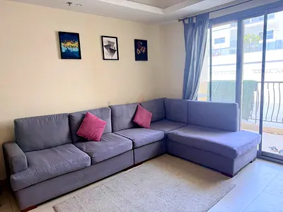 L-shaped grey fabric sectional sofa - good condition