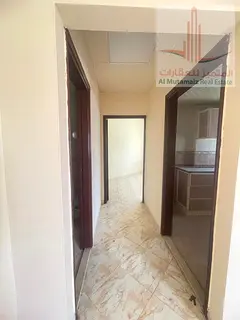 A 1-bedroom apartment is available for annual rent in a prime location in Al Rashidiya 1, Ajman. The