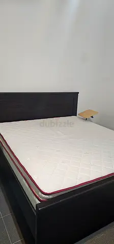 King bed frame with mattress - dark wood headboard, good condition