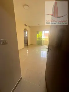 A 1-bedroom apartment is available for annual rent in a prime location in Al Nuaimiya 2, Ajman. The