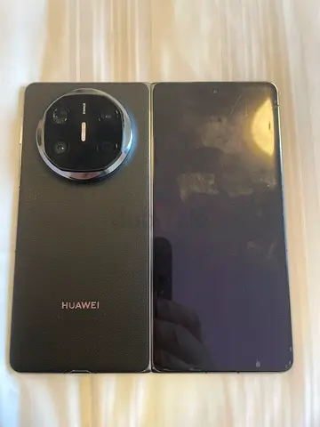 Huawei Mate X6 Pro (3 months old) - good condition, leather back case, folding with latest tech.