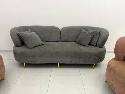3-piece sofa set - grey 2-seater sofa with 2 round orange swivel chairs