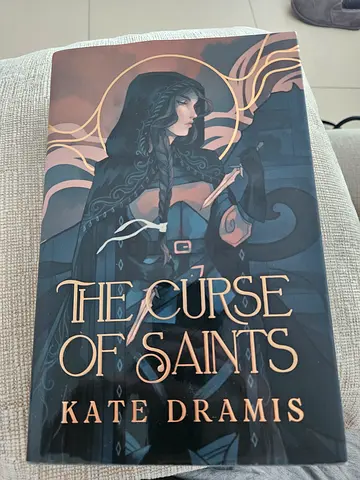 The curse of saints- Kate Dramis fairyloot edition fantasy romance book