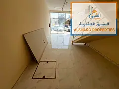 Large Commercial Shop with Mezzanine for Annual Rent in Al Rawda 3, Ajman | Spacious Area | Mezzanin
