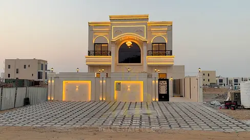 Villa for sale in Ajman | Al Helio 2 area | 5 bedrooms, majlis, 2 living rooms and maid's room | Freehold ownership for all nationalities | Price incl