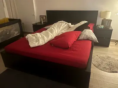 Dark wood double bed frame with headboard - good condition