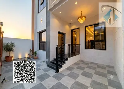 Townhouse for sale in Ajman, Al Zahiyah area. 4 bedrooms, majlis, 2 living rooms, and maid's room.