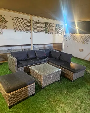 Outdoor rattan corner sofa set with glass coffee table - good condition
