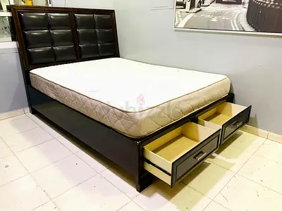Queen storage bed with upholstered headboard and mattress