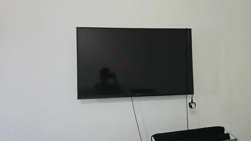 42–50 inch Wall-Mounted LED TV - Good Working Condition