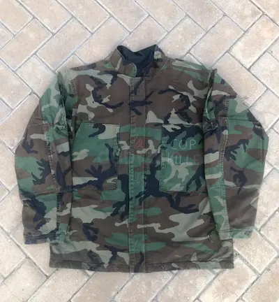 Original and Rare US Army Chemical jacket in woodland camo with graffiti of Ice - T's album 'Body Co