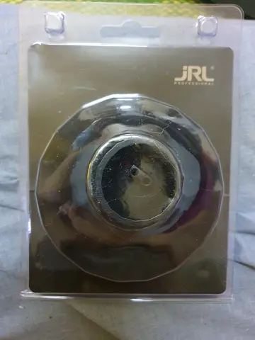 JRL branded small round electronic accessory (sealed packaging)