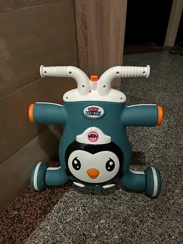 Penguin ride-on walker for toddlers - excellent condition