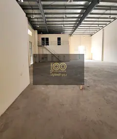 The warehouse features a mezzanine office level, providing additional space suitable for management 