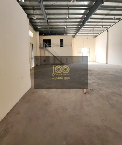 The warehouse features a mezzanine office level, providing additional space suitable for management and administrative offices.